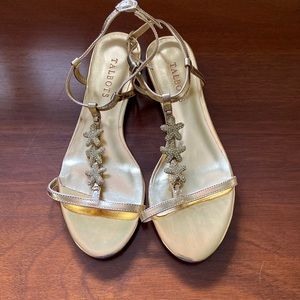 Gold flat sandals - never worn; starfish gold stone design
